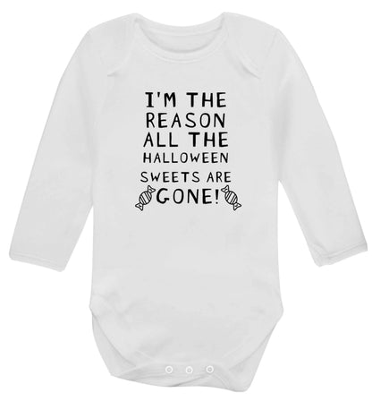 I'm the reason all of the halloween sweets are gone baby vest long sleeved white 6-12 months