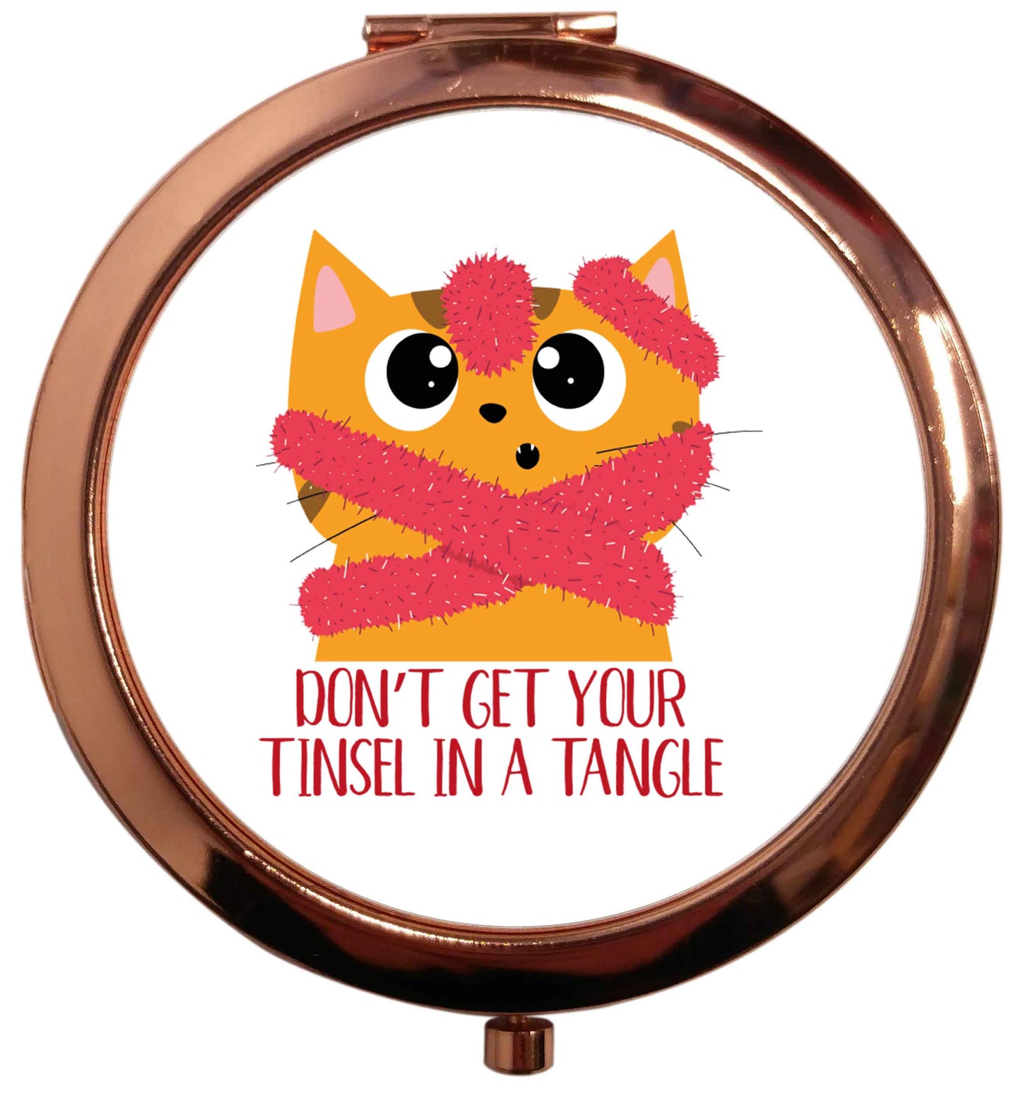 Don't get your tinsel in a tangle rose gold circle pocket mirror