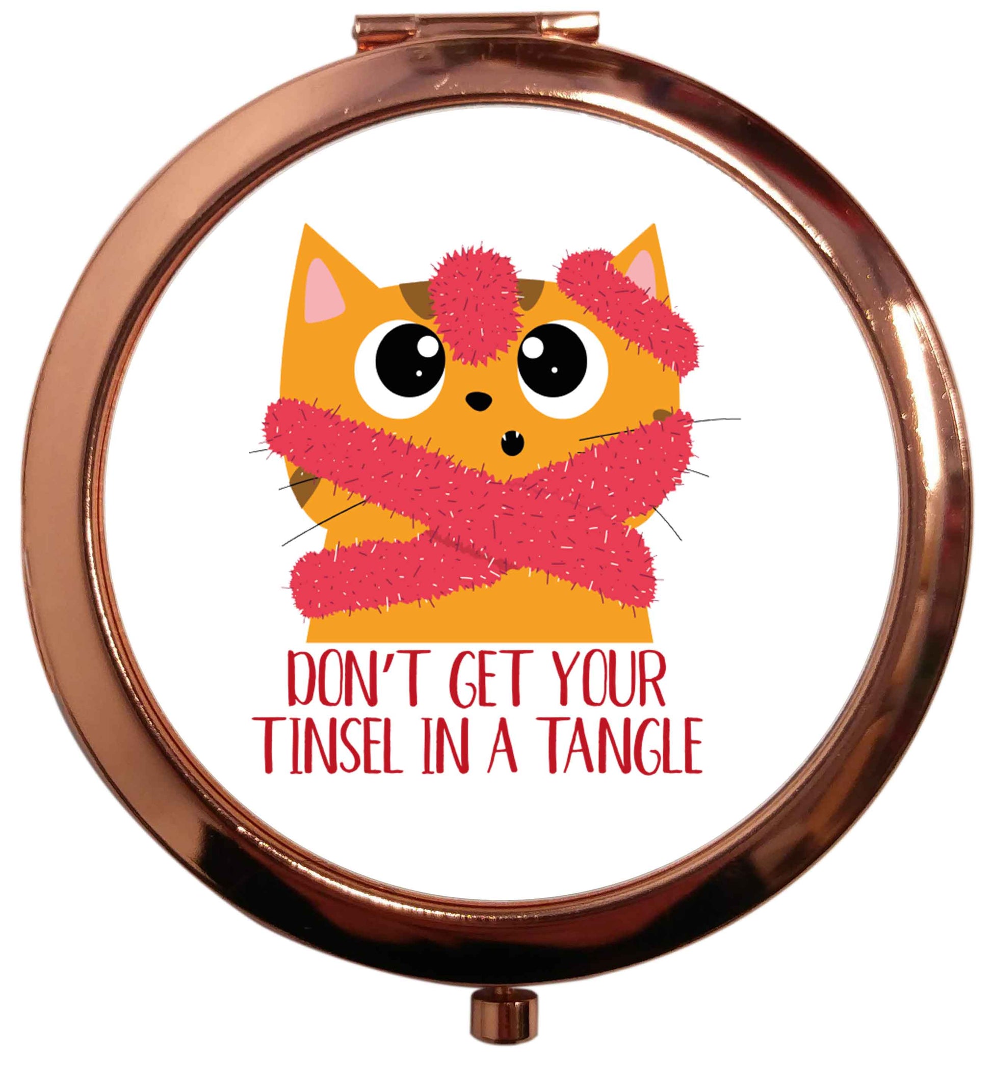 Don't get your tinsel in a tangle rose gold circle pocket mirror