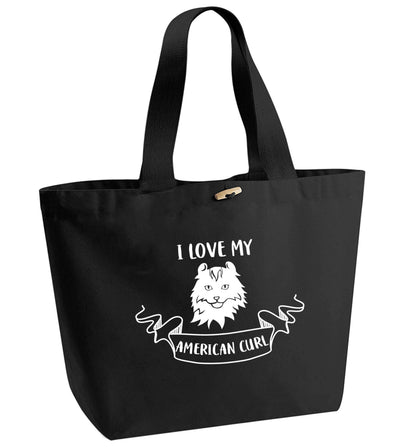 I love my American curl organic cotton premium tote bag with wooden toggle in black