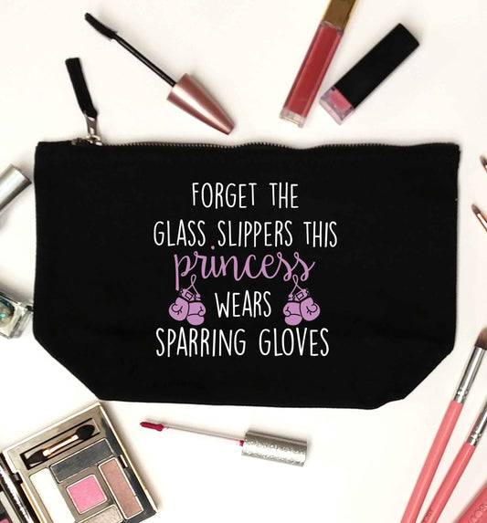 Forget the glass slippers this princess wears sparring gloves black makeup bag