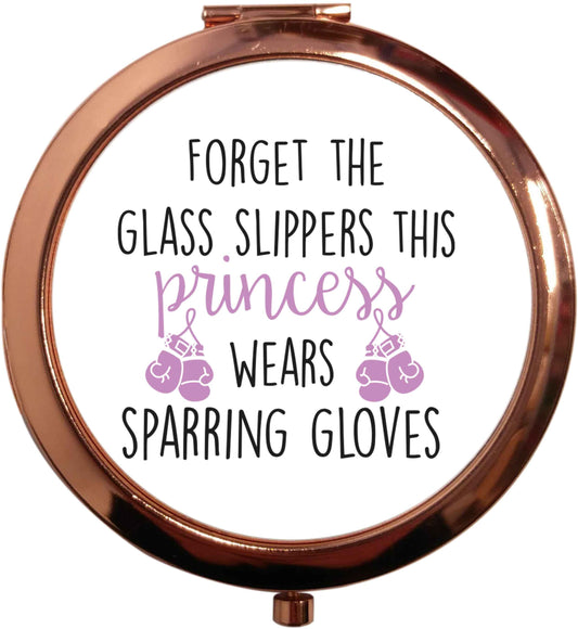 Forget the glass slippers this princess wears sparring gloves rose gold circle pocket mirror