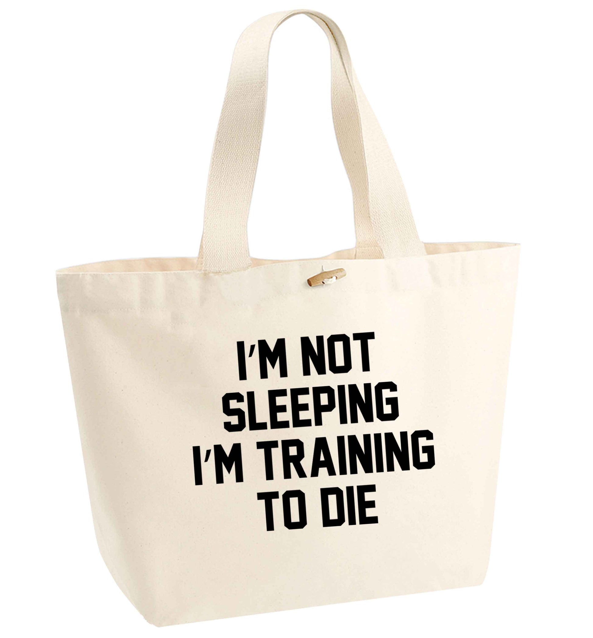 I'm not sleeping I'm training to die organic cotton premium tote bag with wooden toggle in natural