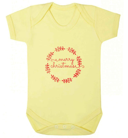 Merry christmas baby vest pale yellow 18-24 months
