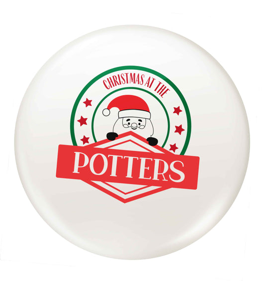 Christmas at the ... family name! small 25mm Pin badge