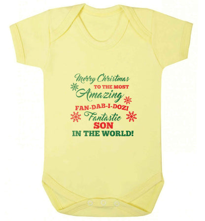 Merry Christmas to the most amazing fan-dab-i-dozi fantasic Son in the world baby vest pale yellow 18-24 months