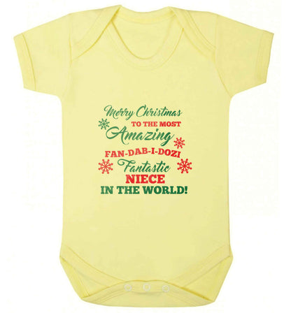 Merry Christmas to the most amazing fan-dab-i-dozi fantasic Niece in the world baby vest pale yellow 18-24 months