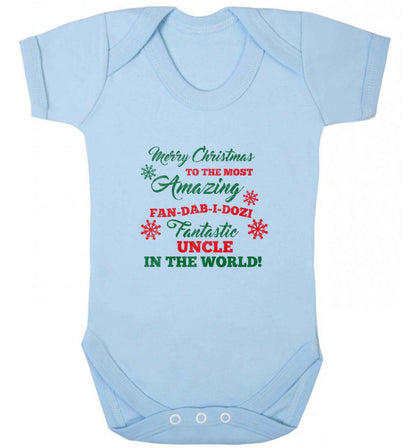 Merry Christmas to the most amazing fan-dab-i-dozi fantasic Uncle in the world baby vest pale blue 18-24 months