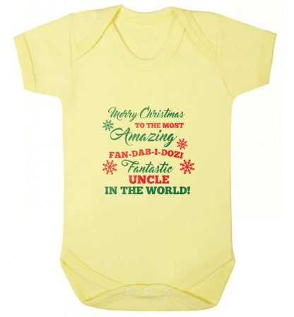 Merry Christmas to the most amazing fan-dab-i-dozi fantasic Uncle in the world baby vest pale yellow 18-24 months