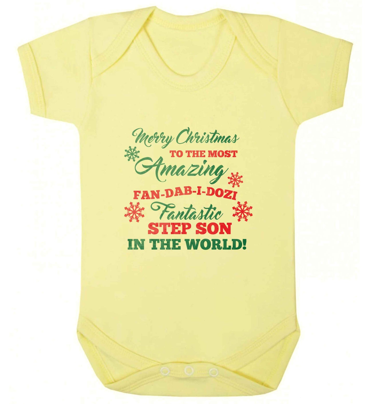 Merry Christmas to the most amazing fan-dab-i-dozi fantasic Step Son in the world baby vest pale yellow 18-24 months