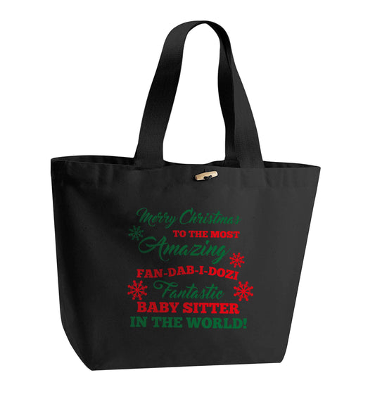 Merry Christmas to the most amazing fan-dab-i-dozi fantasic baby sitter in the world organic cotton premium tote bag with wooden toggle in black