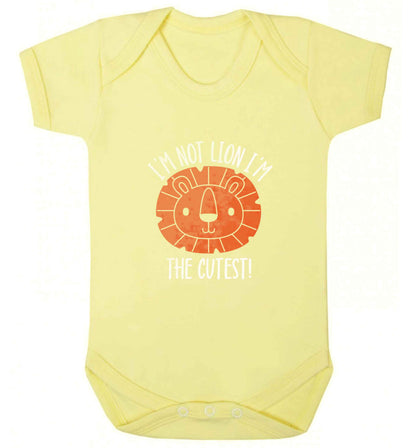 I'm not lion I'm the cutest baby vest pale yellow 18-24 months