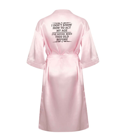 I don't know how to act my age I've never been this old before XL/XXL pink ladies dressing gown size 16/18