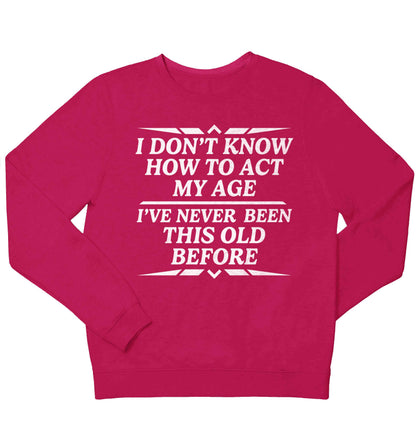 I don't know how to act my age I've never been this old before children's pink sweater 12-13 Years