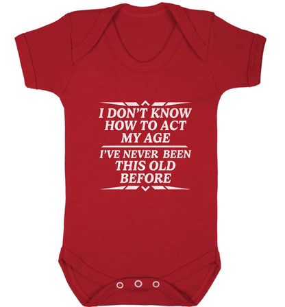 I don't know how to act my age I've never been this old before baby vest red 18-24 months