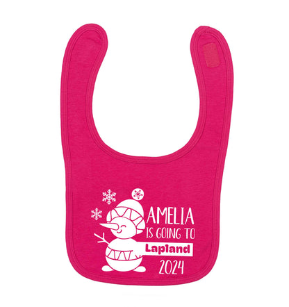 Any name here - is going to Lapland personalised dark pink baby bib