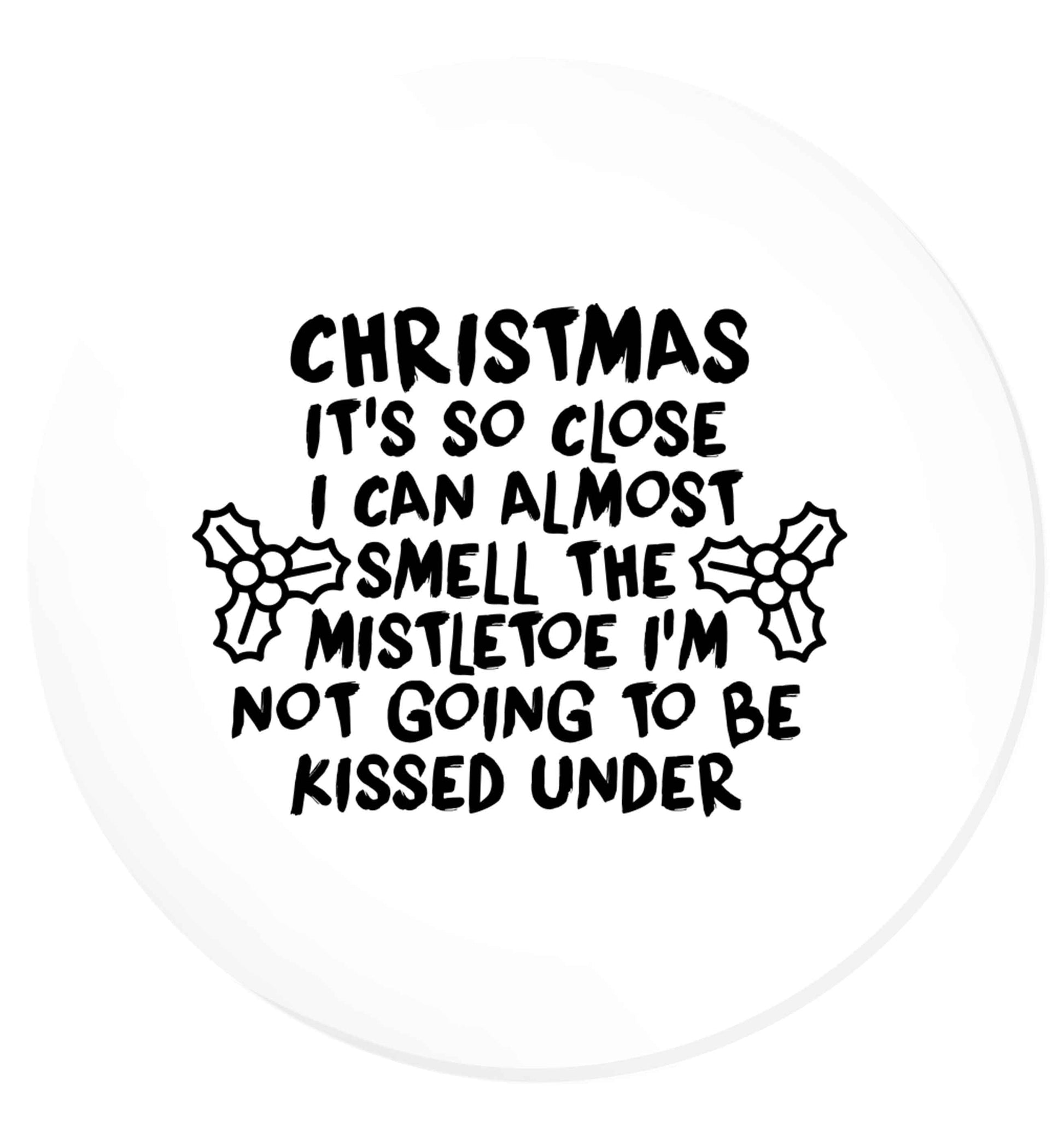 Christmas it's so close I can almost smell the misteltoe I'm not going to be kissed under | Magnet