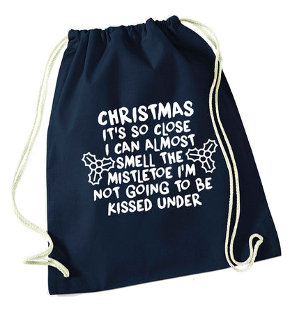 Christmas it's so close I can almost smell the misteltoe I'm not going to be kissed under navy drawstring bag
