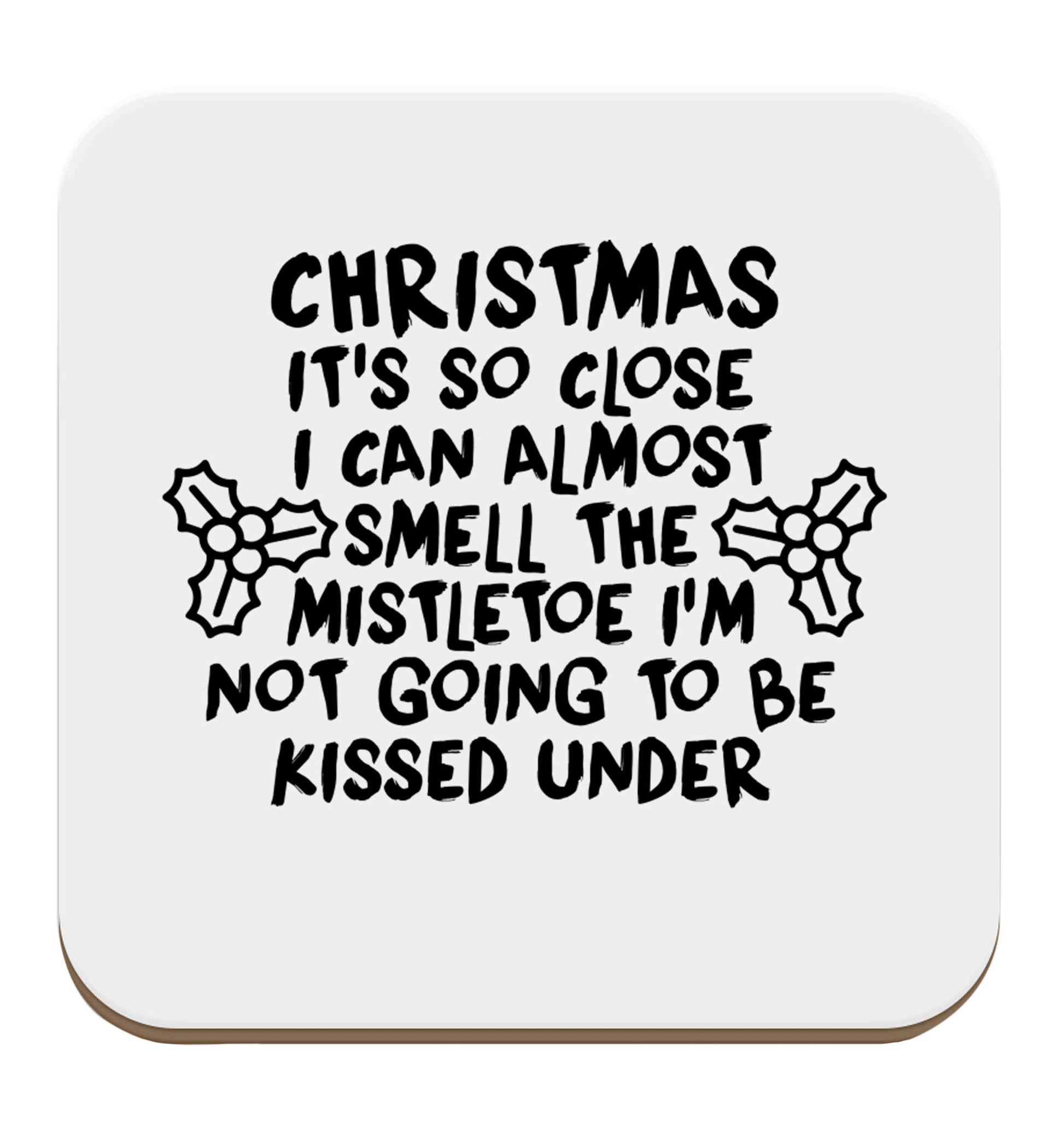 Christmas it's so close I can almost smell the misteltoe I'm not going to be kissed under set of four coasters