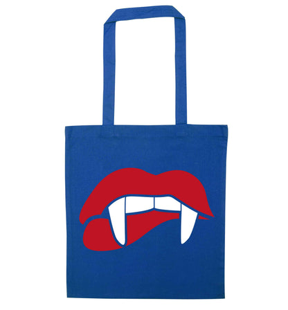 Vampire fangs blue tote bag