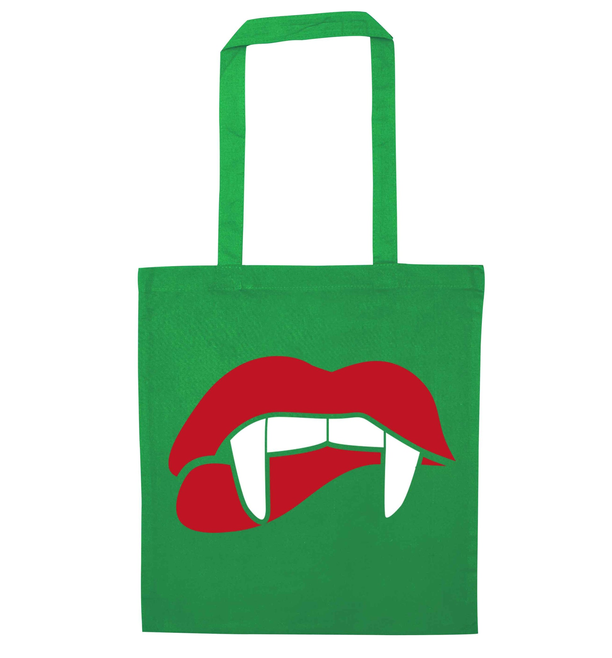 Vampire fangs green tote bag