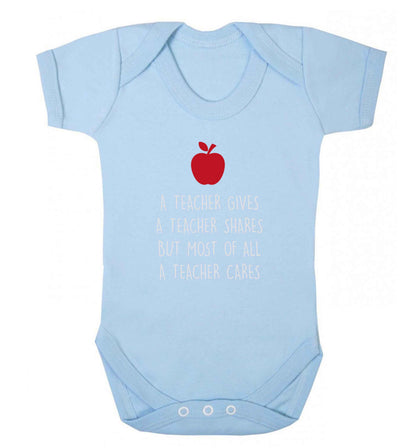 A teacher gives a teacher shares but most of all a teacher cares baby vest pale blue 18-24 months