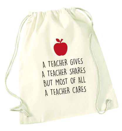 A teacher gives a teacher shares but most of all a teacher cares natural drawstring bag