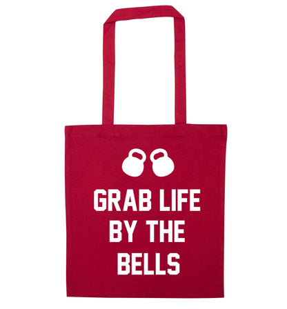 Grab life by the bells red tote bag