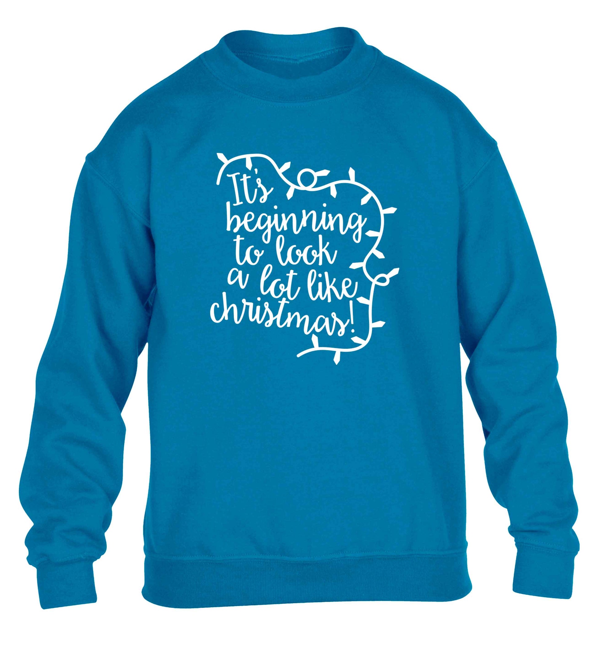 It's beginning to look a lot like Christmas children's blue sweater 12-13 Years