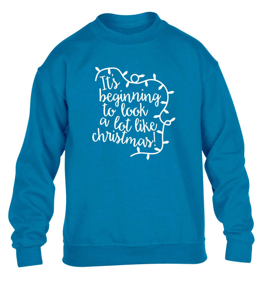 It's beginning to look a lot like Christmas children's blue sweater 12-13 Years