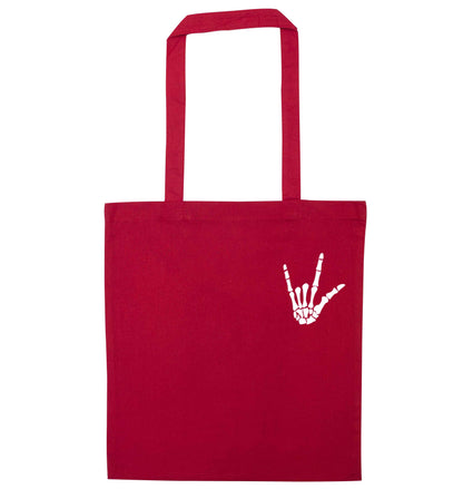Skeleton Hand Pocket red tote bag
