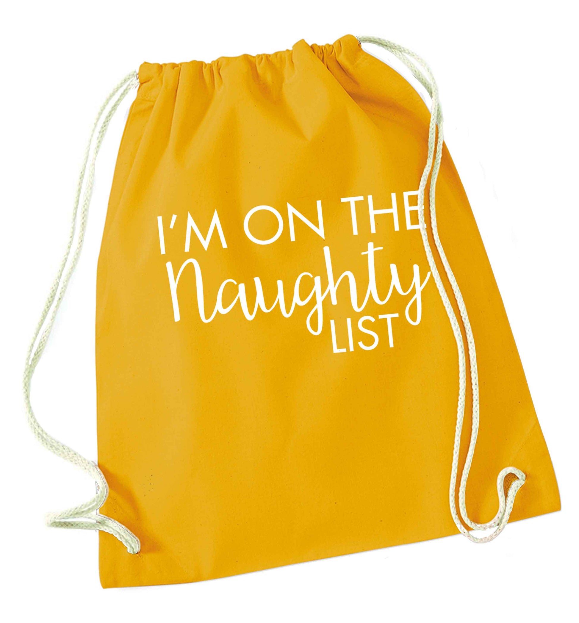 I'm on the naughty list mustard drawstring bag